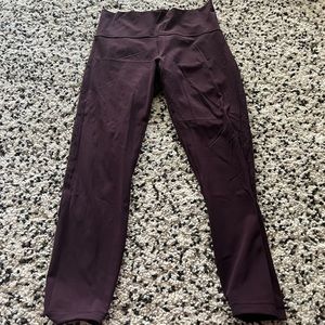 Plum colored lulu crops with floral mesh